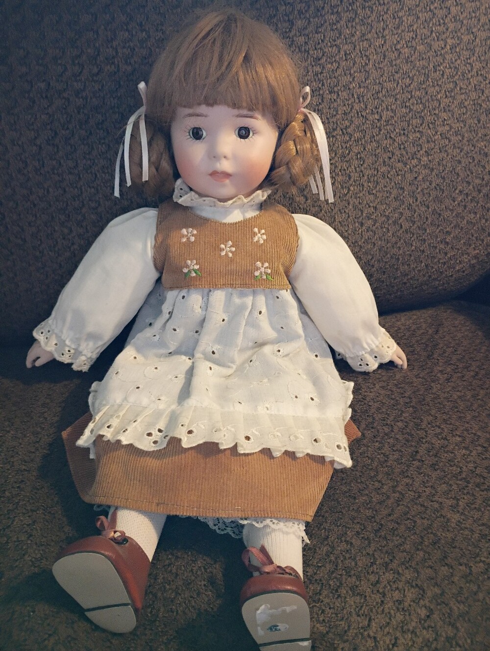 Vintage Porcelain Doll in White and Brown Dress - Classic Collectible Doll
